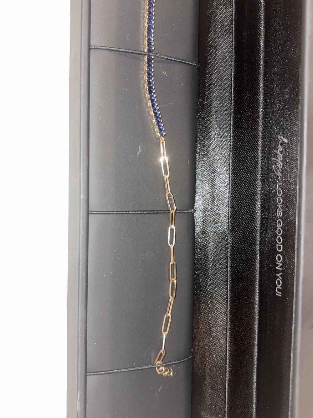 Striking baguette-cut blue sapphires are set in a refined linear design